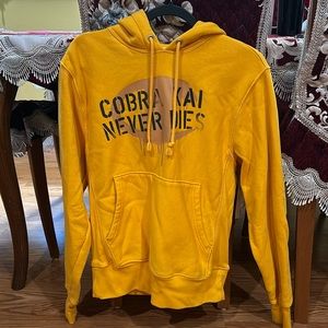 Yellow Cobra Kai Hoodie “Cobra Kai Never Dies”